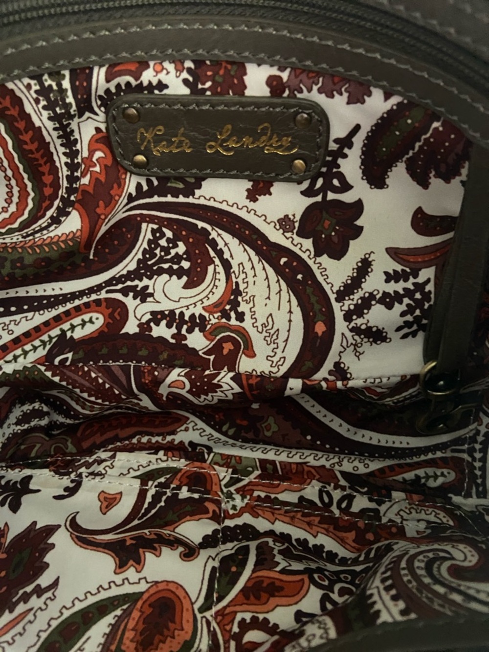 Kate Landry Brown and Taupe Decorative Crest Wristlet - Picture 3 of 6